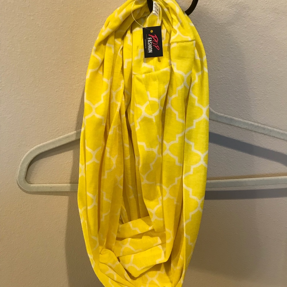 Infinity scarf with hidden zipper pocket.